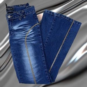 Vintage 2000s faded flare denim jeans.